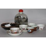 A collection of mixed Oriental ceramics and snuff bottles