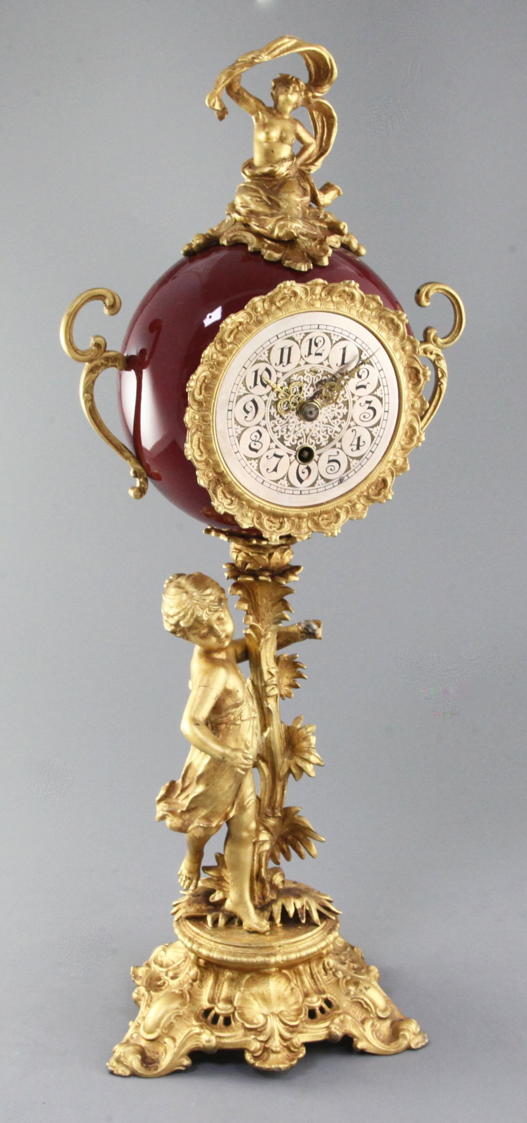 A 19th century French gilt spelter mantel timepiece, 22.5in.