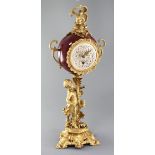 A 19th century French gilt spelter mantel timepiece, 22.5in.