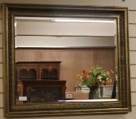 A gilt framed rectangular wall mirror, W.91cm