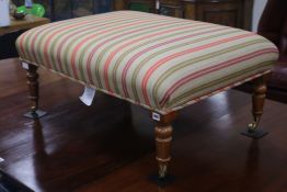 A Duresta Victorian style footstool, W.96cm