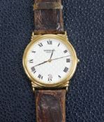 A gentleman's Raymond Weil gold plated and steel quartz wrist watch.