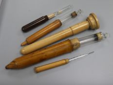 A collection of treen medical containers