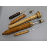 A collection of treen medical containers