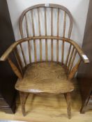 A mid 19th century ash Windsor armchair