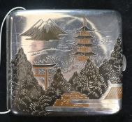 A Japanese silver and mixed metal cigarette case.
