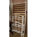 A pair of cream metal bed frames, W.92cm