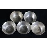 Five Indian white metal bowls. with engraved decoration.