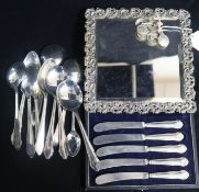 A set of six late Victorian silver buttons by Samuel Jacob, silver plated framed mirror and a