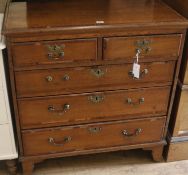 A George II oak and mahogany banded chest of drawers, W.84cm