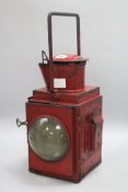 A red British rail lamp