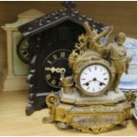 A Cuckoo clock, gilt clock and another