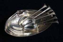 A sterling silver shell shaped dish and a set of six silver teaspoons.