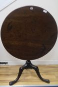 A Georgian mahogany circular tilt-top tripod table, W.81cm