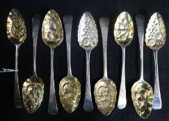 Four pairs of 19th century silver Old English pattern "berry" spoons including one by Peter, Ann &