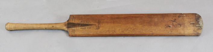 A 1920's A.W. Cochrane giant size Champion cricket bat, made for advertising purposes,