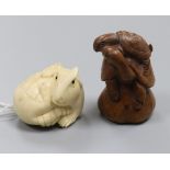 Two signed netsuke (one ivory, the other wood)