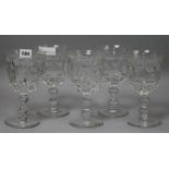 A set of five Victorian wine glasses with moulded bowls