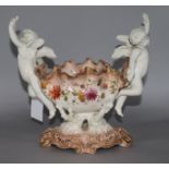 A Moore Bros. blush ground cherub vase