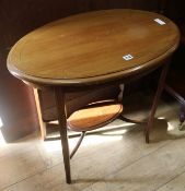 An Edwardian mahogany two tier occasional table, H.73cm