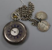 A silver half hunter pocket watch and albert chain hung with three coins.