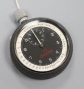 An Omega black face stopwatch, (each revolution equals ten seconds).