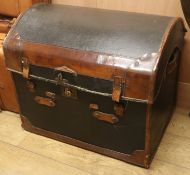 A leather trunk on wheels, W.69cm