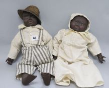 Two American naive dolls
