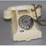 A cream Bakelite telephone