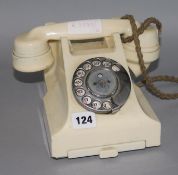 A cream Bakelite telephone