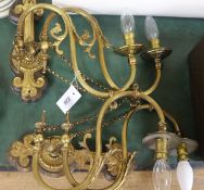 A pair of ormolu twin branch wall lights