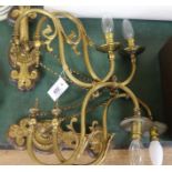 A pair of ormolu twin branch wall lights