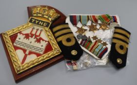 A Lawman medals and paperwork and naval plaque, badges, miniatures etc