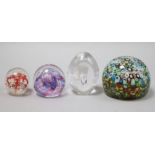 Four paperweights