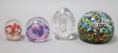 Four paperweights