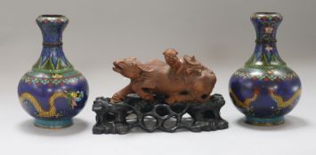 A pair of Chinese cloisonne enamel dragon vases and a wood carving of an ox and child