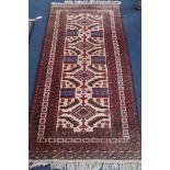 A Soumak cream and red ground rug, 190 x 96cm