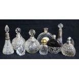 Assorted scent bottles including silver mounted and a Lalique Nina Ricci bottle.