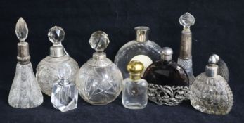 Assorted scent bottles including silver mounted and a Lalique Nina Ricci bottle.