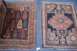 Two red and blue ground rugs, 120 x 90cm & 120 x 100cm