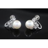 A pair of 14ct white gold, cultured pearl and diamond cluster set ear clips, 13mm.