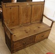 A Victorian pine panelled bench, W.135cm