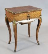 A 19th century French ormolu mounted kingwood work table, with internal mirror and frieze drawer,