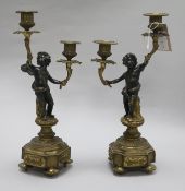 A pair of bronze and ormolu candelabra