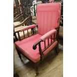 A Victorian mahogany armchair, with open sides