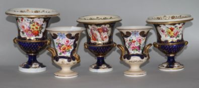 A garniture of three Derby campana shaped vases (a.f.) and a pair of ditto (5)