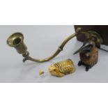 An 18th century brass candle sconce, treen woodpecker and bone turtle perfue vier