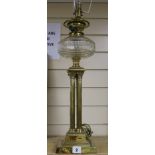 A brass column lamp