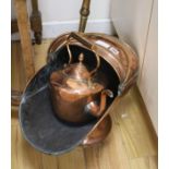 A Victorian copper coal scuttle, a long-handled warming pan and a kettle