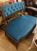 A small Victorian gilt and upholstered settee, W.100cm